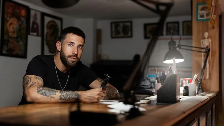 side-view-tattoo-artist